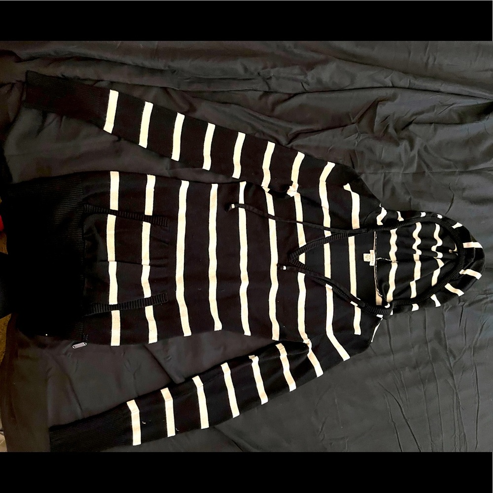 Long sleeve Guess shirt. Black and white stripes, with silver glitter stripes.